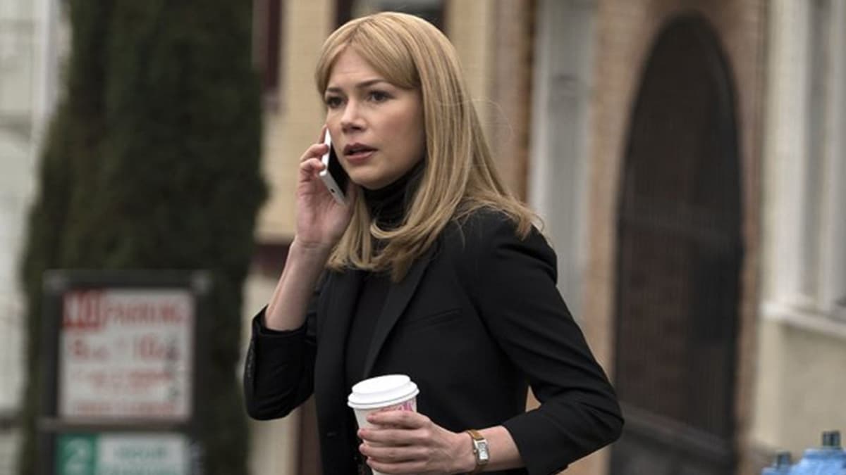 Michelle Williams on phone in Venom.