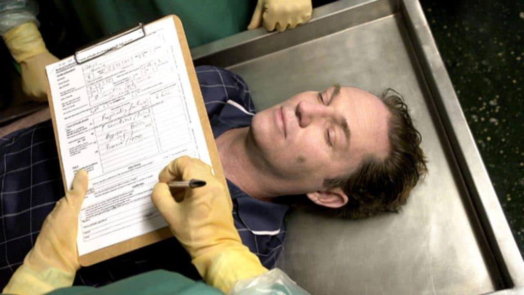 Man in mortuary during Autopsy Number Four.