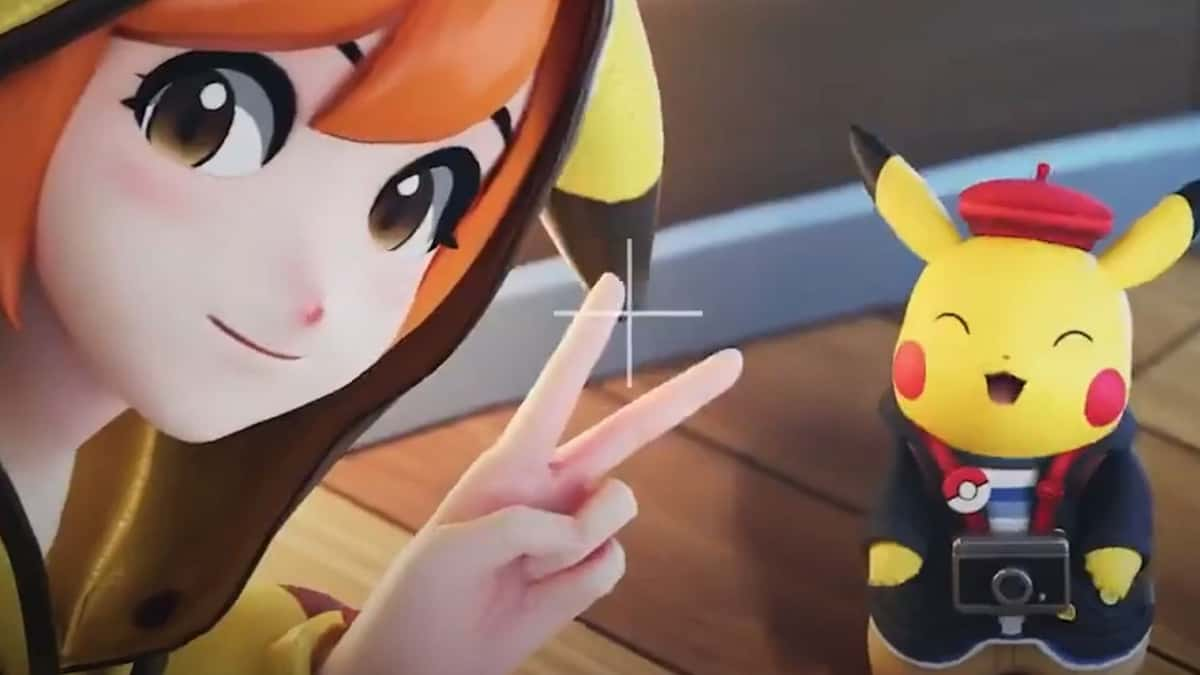 Pokemon Trainer posing with a Pikachu