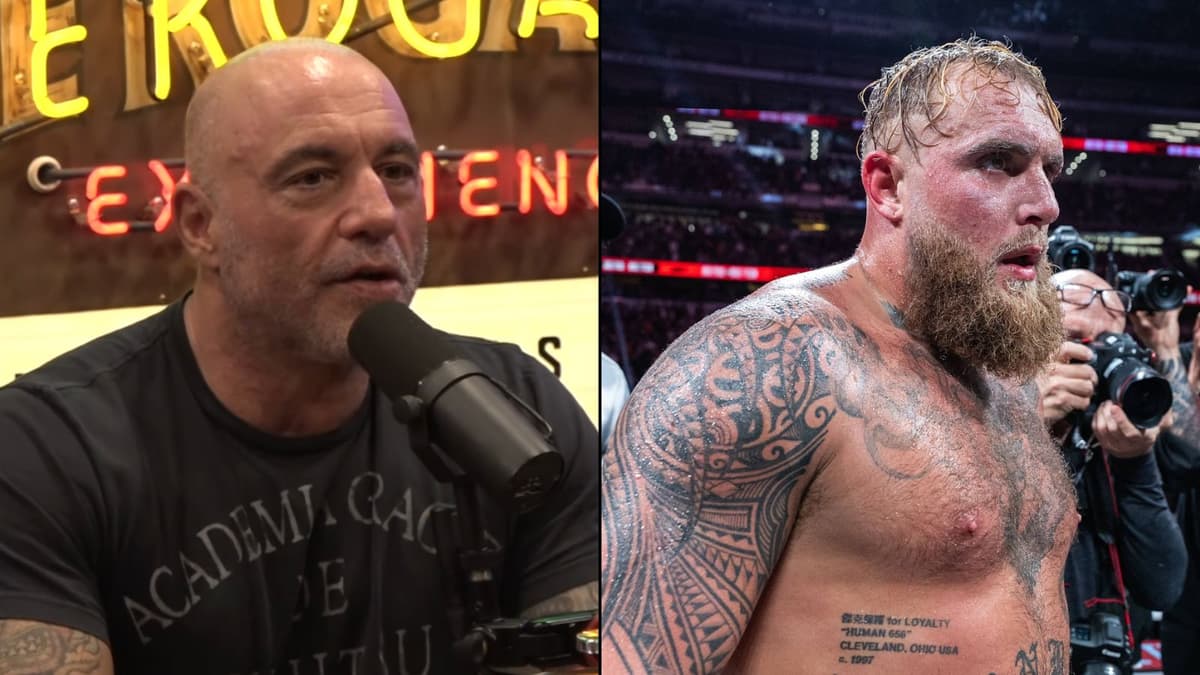 Joe Rogan talking to mic next to Jake Paul inside ring for Mike Tyson fight