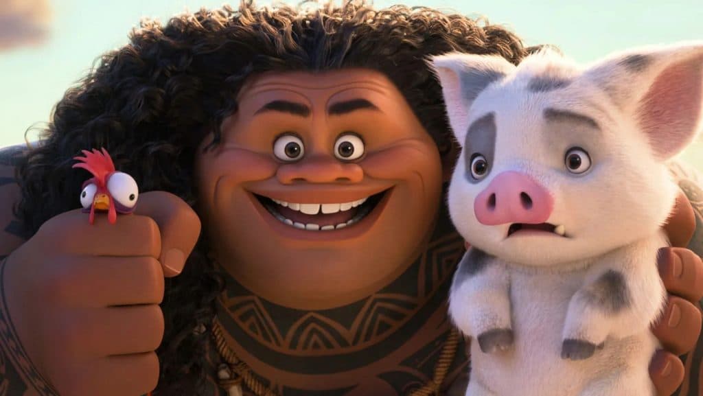 Maui in Moana 2 holding a chicken and pig