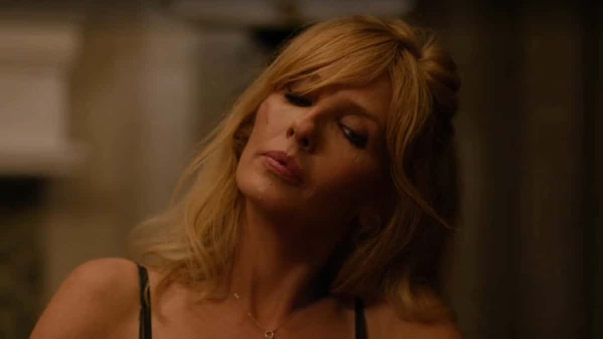 Beth Dutton as Kelley Reilly in Yellowstone during the Travis strip poker scene