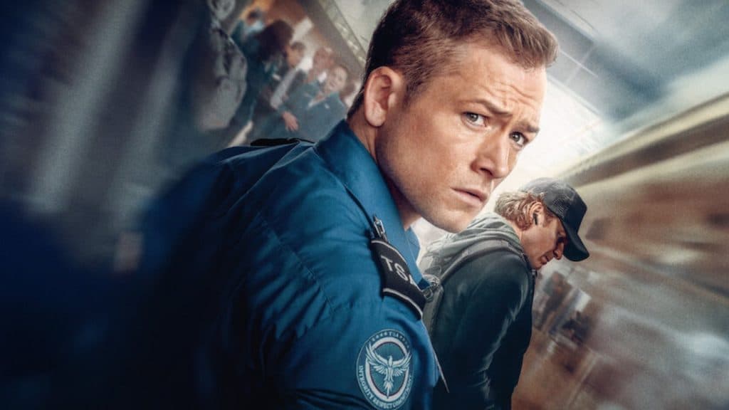 Taron Egerton on the Carry-On poster.