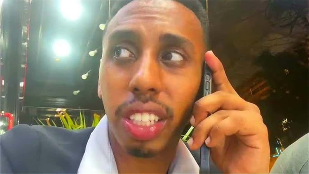 johnny somali on his phone