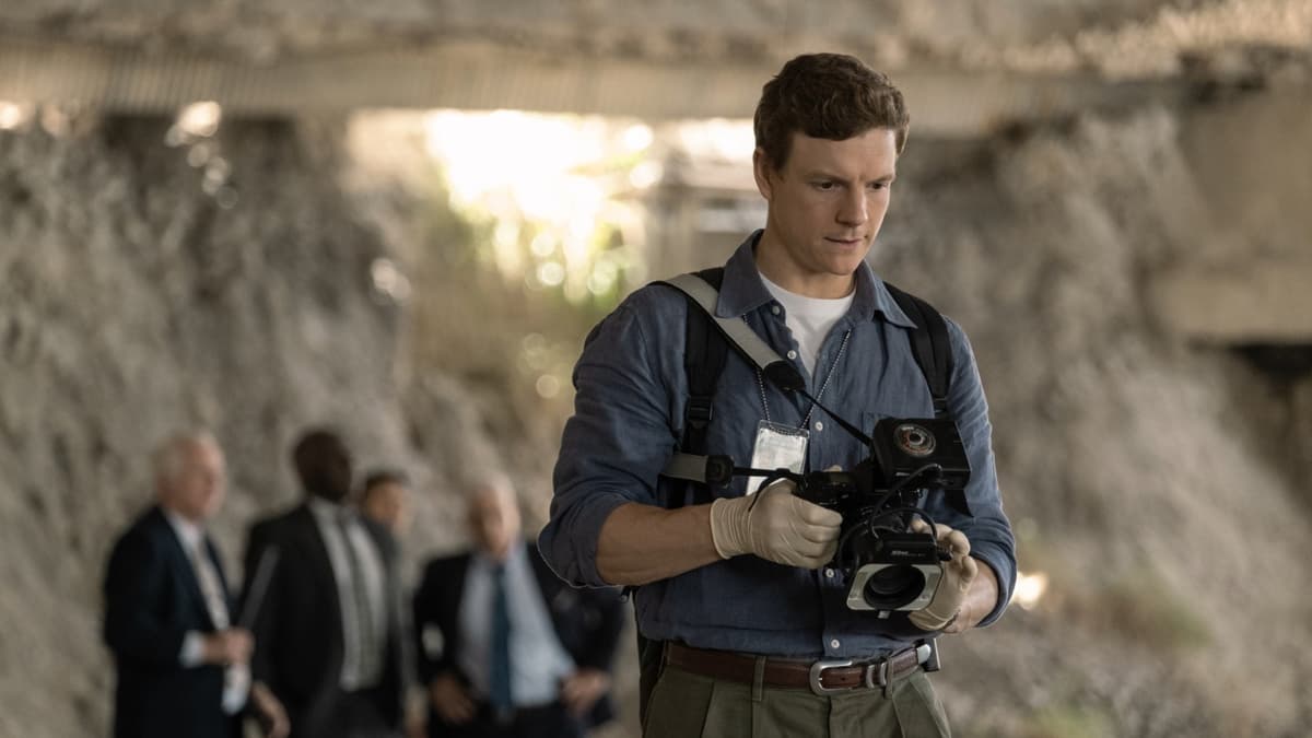 Dexter Original Sin Episode 6 recap: Patrick Gibson as Dexter holding a camera