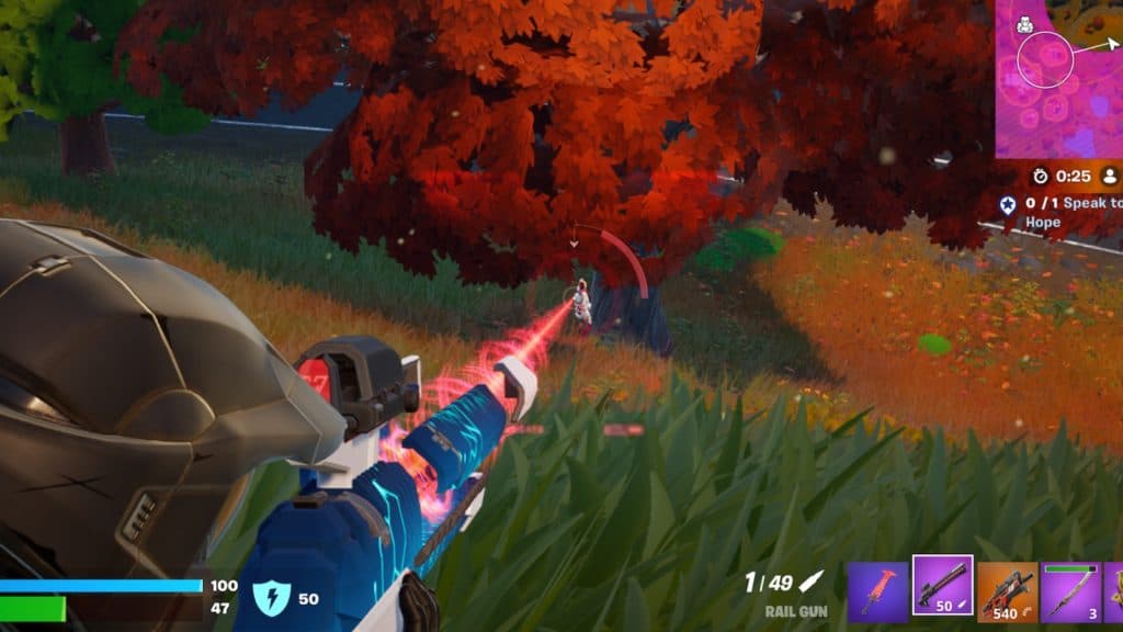 A screenshot featuring the Rail Gun emitting a red beam when charged in Fortnite.