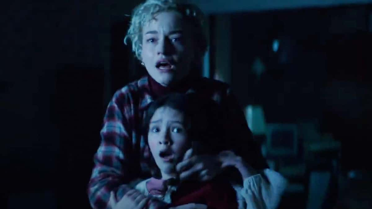 Julia Garner looking terrified in Wolf Man.