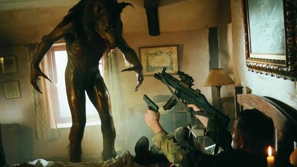 A soldier shoots a werewolf in Dog Soldiers