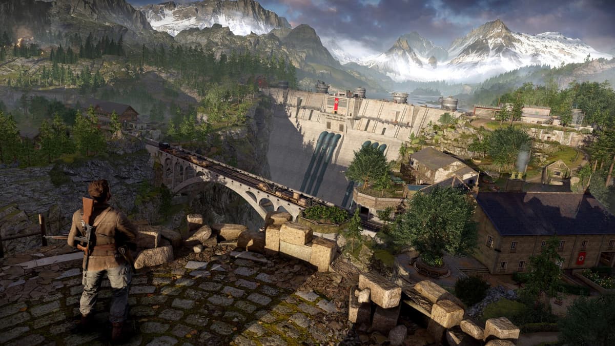 The protagonist in Sniper Elite: Resistance stands above a town