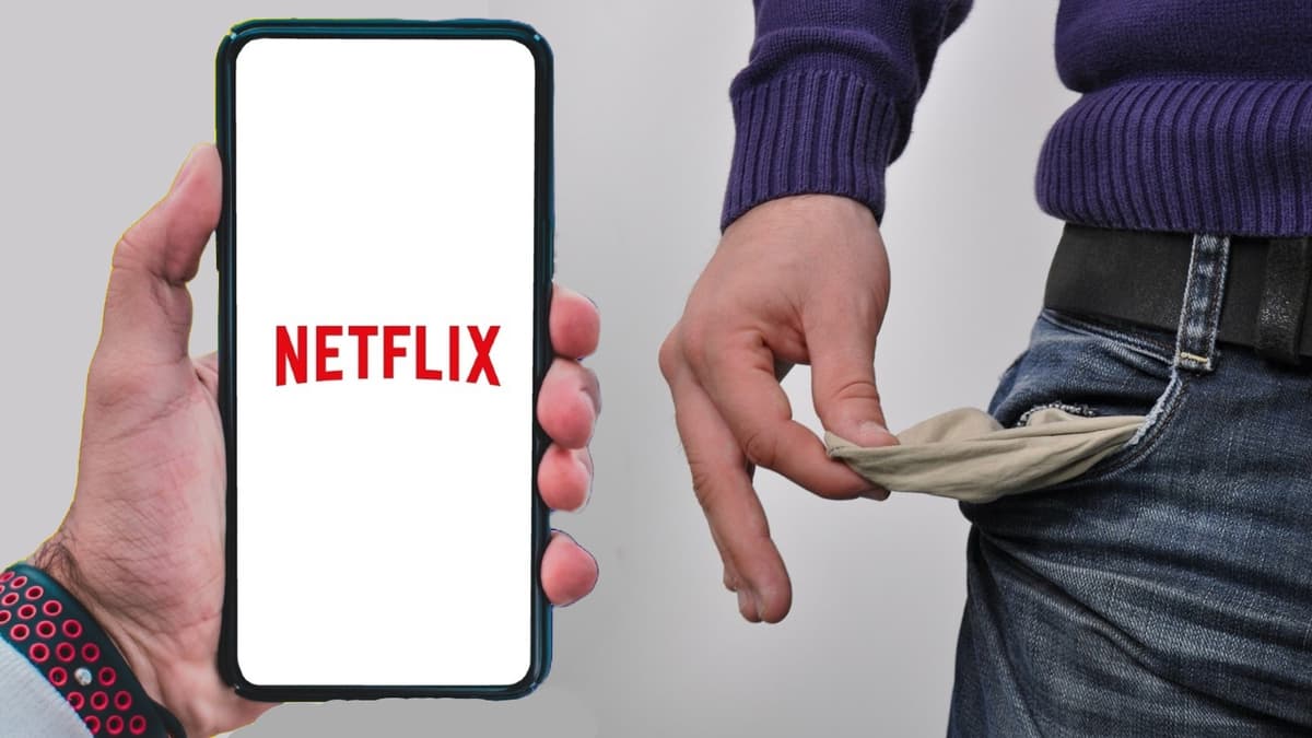 Someone holding a phone with the Netflix logo and empty pockets