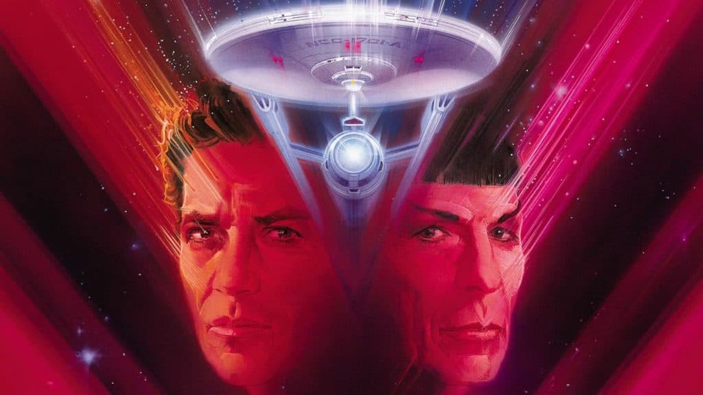 The enterprise flies past kirk and Spock in a stylised poster