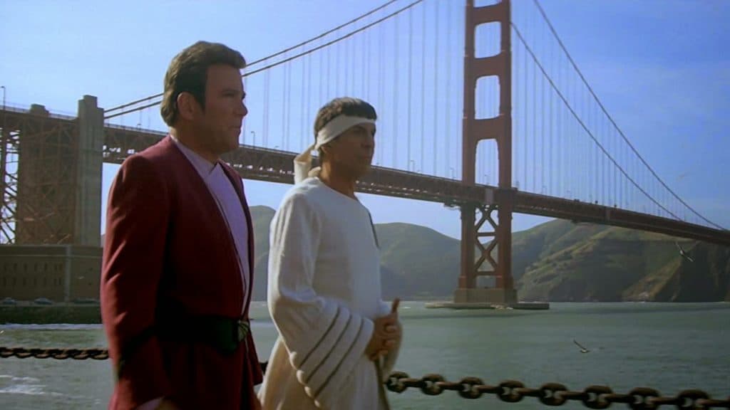 Kirk and Spock walk through San Francisco with the Golden Gate Bridge in the background