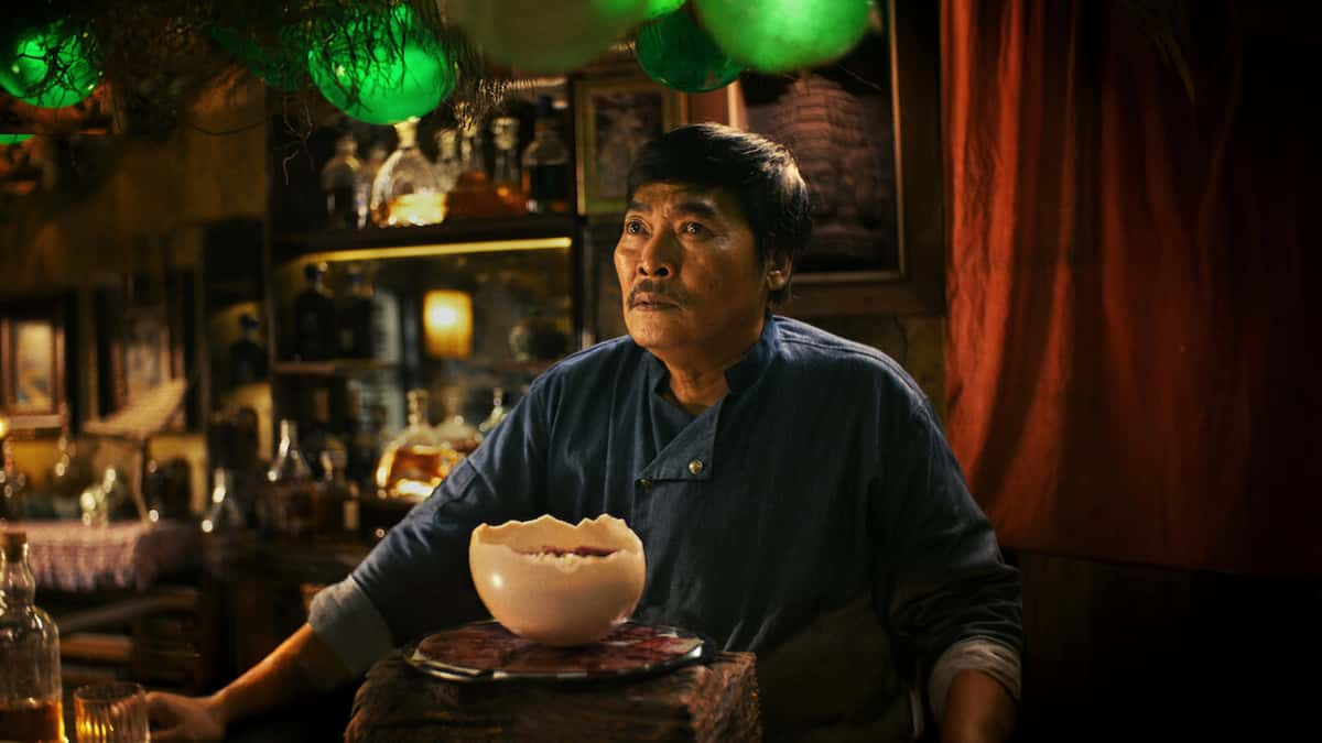 Man standing behind a counter in Devil's Diner on Netflix