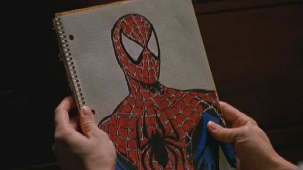 A sketchbook showing a drawing of SPider-Man