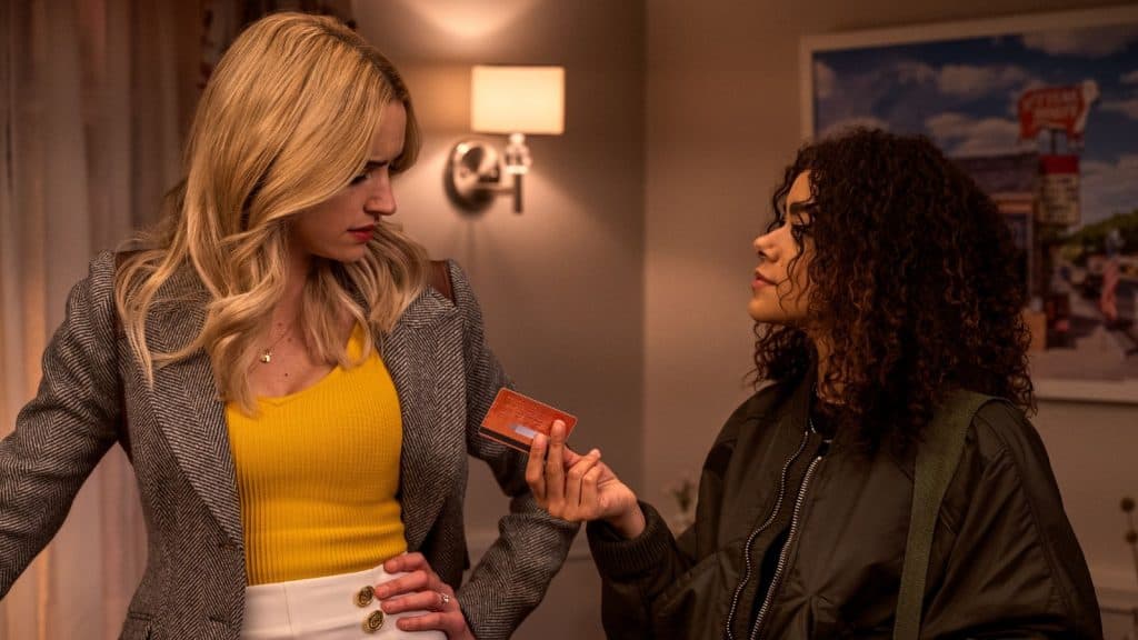 Ginny shows Georgia a credit card in Ginny & Georgia