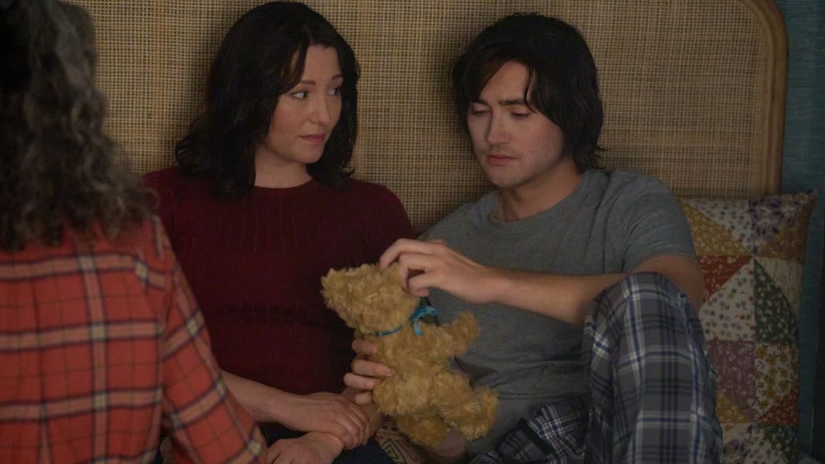 Kat and Jacob look at a teddy bear in The Way Home Season 3