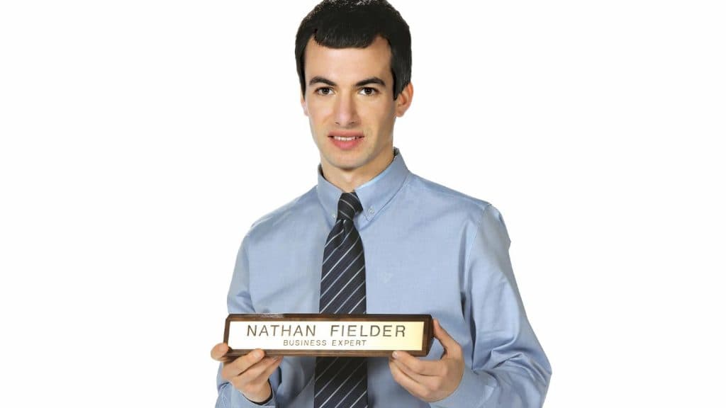 Nathan Fieder holding a Nathan Fielder sign.