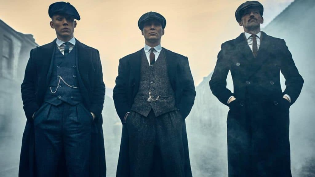 The Shelby brothers with hands in pockets in Peaky Blinders.