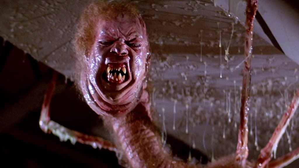 A mutated head rises up to the ceiling in The Thing