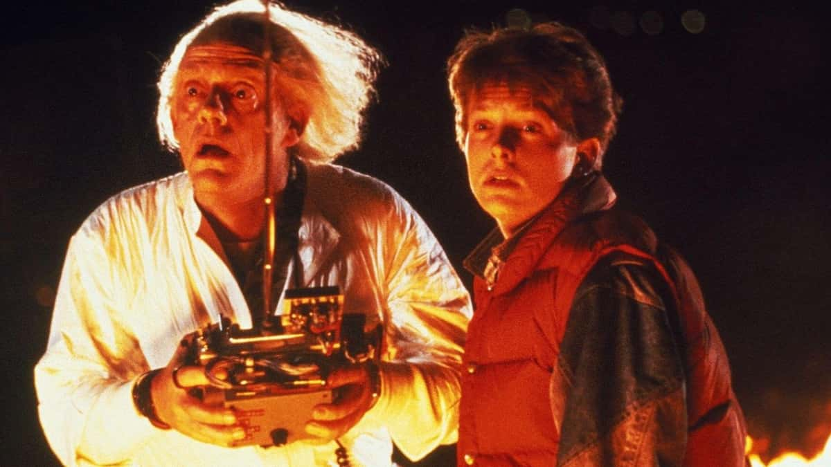 Doc and Marty look at the DeLorean in Back to the Future.